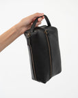 Full grain leather necessaire. Essential travel accessory. Small makeup bag
It is lined with cotton fabric. Wide-open interior for easy access to toiletries and other daily essentials. Featuring two zippered exterior pockets.